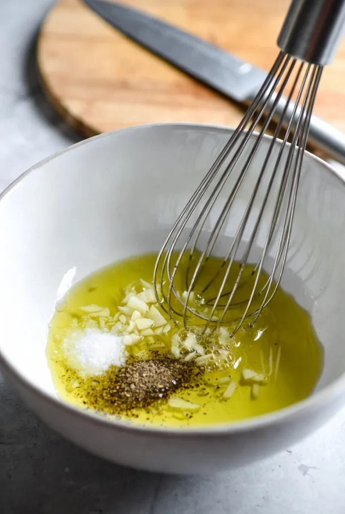 small bowl, whisk together olive oil, lemon juice