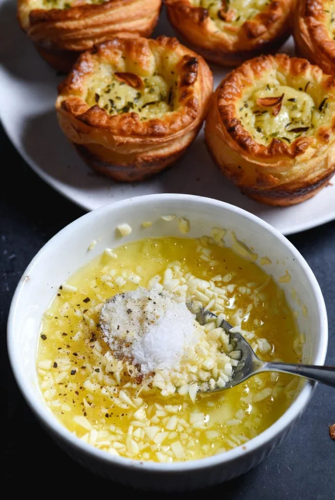 small bowl, combine melted butter, minced garlic, salt, and black pepper